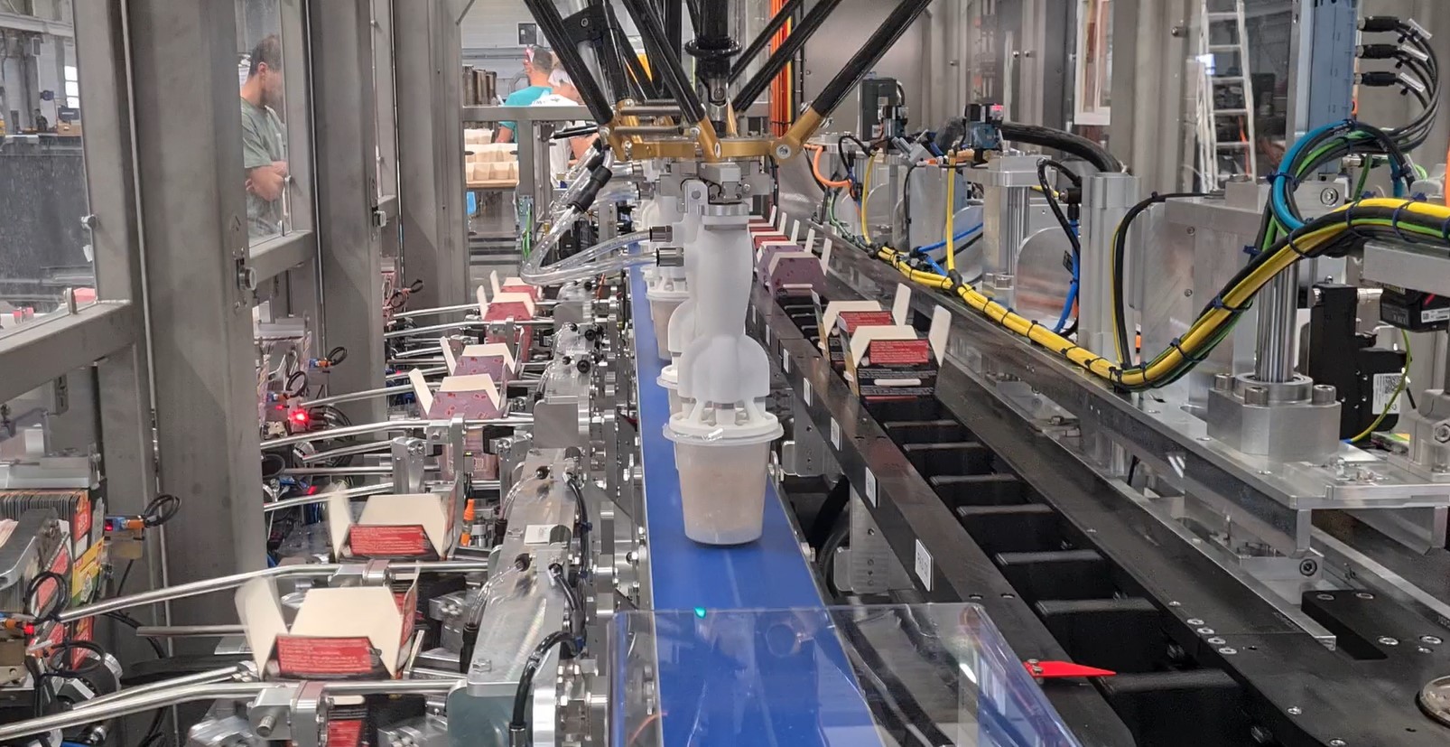 Etude de cas MG Tech - Automatisation mise sous fourreau pots
